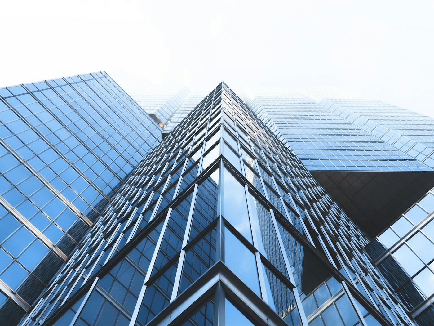 Glass facade of a modern finance tower